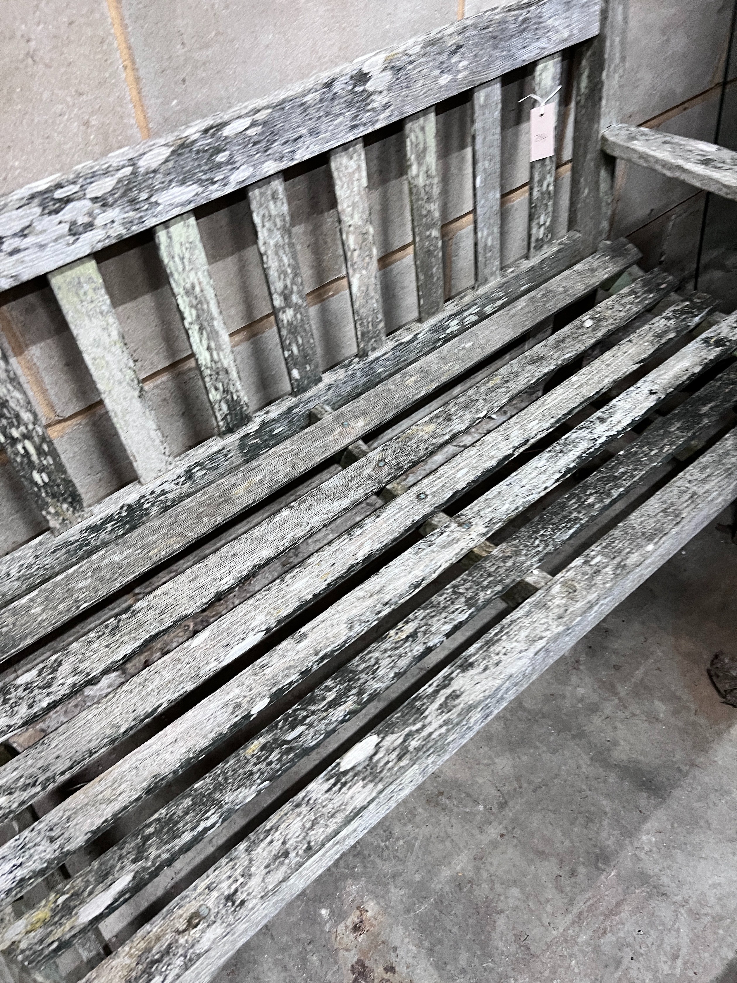 A Lister weathered teak garden bench, length 128cm *Please note the sale commences at 9am.